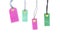 Blank multicolored labels tags made of cardboard or price notes of pink and green color isolated on white background.