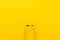 Blank nine-volt battery on the yellow background with copy space