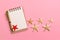 Blank note book with starfish or seashells on a pink background , summer vaction concept
