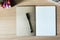 Blank notebook over wooden table
