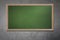 Blank old school blackboard on a grunge wall and can input text