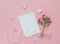 Blank page notepad with small bouquet of roses and hearts on a p