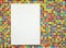 Blank paper board on colorful mosaic