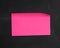 Blank paper pink sticker glued on black chalkboard