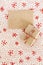 Blank parchment craft and gift on Christmas textile background
