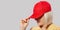 Blank red baseball cap mockup template, wear on women head, isolated, clipping path. Woman in clear hat and t shirt mock