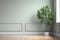 Blank sage green wall in house with green tropical tree