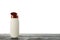 Blank shampoo bottle on wooden table isolated on background