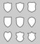 Blank shields graphic set icons as protection symbol