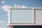 Blank shop sign against clear blue sky