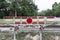Blank sign train track on railway railroad crosses in line road of countryside for warning danger and safety traffic