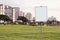 Blank sign in urban park at dusk