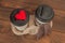 Blank take away coffee cups in carry tray including clipping path and red knit heart and brown scarf
