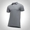 Blank template men grey polo shirt short sleeve, front view half turn bottom-up, on gray background with clipping path.