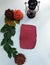 Blank textured paper with pine cones,red flower,mulberry leaves and lantern on white backgroun.flat lay photo