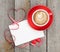 Blank valentines greeting card and red coffee cup