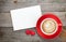 Blank valentines greeting card and red coffee cup