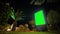 Blank vertical advertising green billboard poster, pillar at night - timelapse