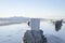 Blank white coffee mug on a old pier wetland