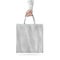 Blank white cotton eco bag design mockup , holding hand