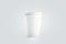 Blank white disposable paper cup with plastic lid mock up