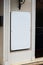 Blank white glass signboard on wall mockup template. Emplty mounted outdoor glass signage for store, hotel or restaurant info mock