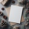 Blank white greeting card mockup, flat lay beautiful background rustic decorated for christmas, shot from above, piencones, pines