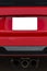 Blank White License Plate On Red Car Vertical