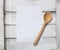 Blank white menu paper template background and wooden spoon on