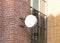 Blank white outdoor round box mock up brick wall mounted