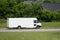 Blank White Panel Truck Exits Freeway Against Green Background