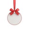 Blank white paper round christmas ball frame tag label card template hanging with shiny red ribbon and bow isolated on white