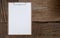 Blank white paper on wooden clipboard