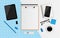 Blank white sheet on clipboard with tablet, coffee cup, notebook, donut, USB Flash Drive, eyeglasses and smartphone on blue and