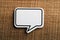 Blank White Speech Bubble Paper On Wooden Background