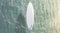 Blank white surfboard with fins on water surface mock up