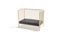 Blank wood cot with black crib sheet mockup, half-turned view