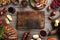 Blank wooden cutting board with succulent steaks and grilled veg