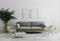 Blank wooden vertical picture frame mockup in modern interior  living room background in gray tones with gray sofa and wooden