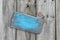 Blank worn sign with heart hanging on old weathered fence