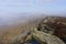 Blanket of fog hides Curbar Edge in the Derbyshire Peak district