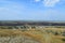 Blasted fields outside the village. The fact that left a fire on the field. the village from the hill view