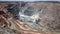 Blasting in the bottom of the Kalgoorlie Super Pit, one of the largest gold mines in the World. Gold was discovered in Kalggorlie