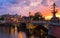 Blauwbrug Blue Bridge over Amstel river in Amsterdam at sunset spring evening, Holland.