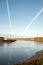 Blaydon on Tyne UK: Jan 2022: River Tyne view on a sunny winter morning. Chemtrails in the sky