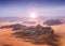 Blazing sun across desert