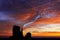 Blazing Sunrise over the Mittens in Monument Valley