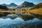 Blea Tarn in the Lake District National Park, with the Langdale Pike\\\'s reflected in the perfectly still waters on a stunning