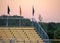 Bleachers at sports game during sunset