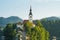 Bled island closeup with boat and pletna on Lake Bled, Sloveni